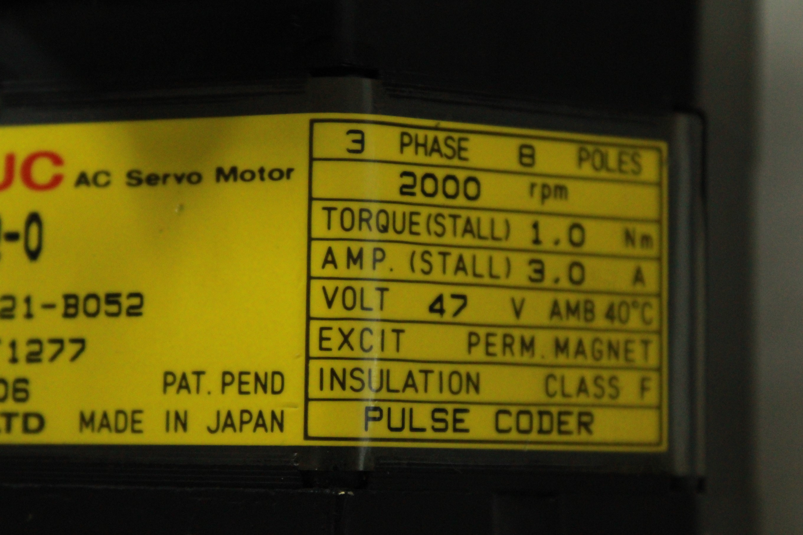 A06B-0521-B052 Servo Fanuc Servo Motor Model 2-0 2000PPR - Vista Superior | Fanuc A06B-0521-B052